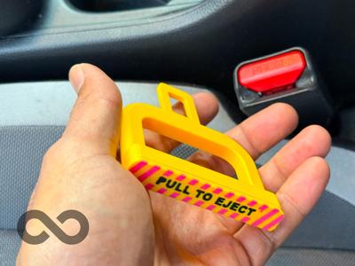 Pull To Eject – Seatbelt Prop/gag Clip