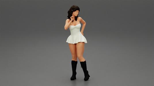 Youn girl wearing mini skirt dress and boots hand on hip