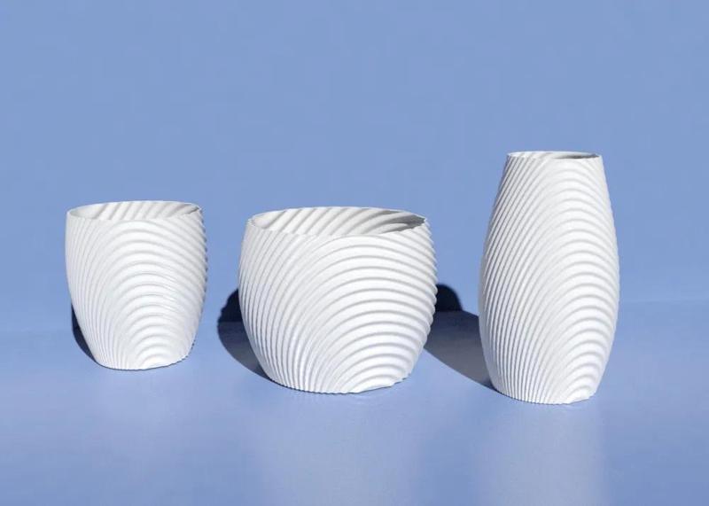 Wavy organic bowl, cups, vase and flower pot.