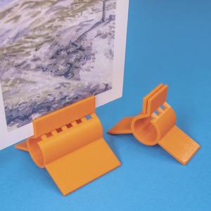 Compliant Stand Clips