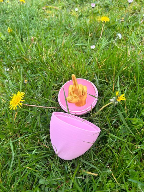 Easter egg with thread and friendly hand (L & R)