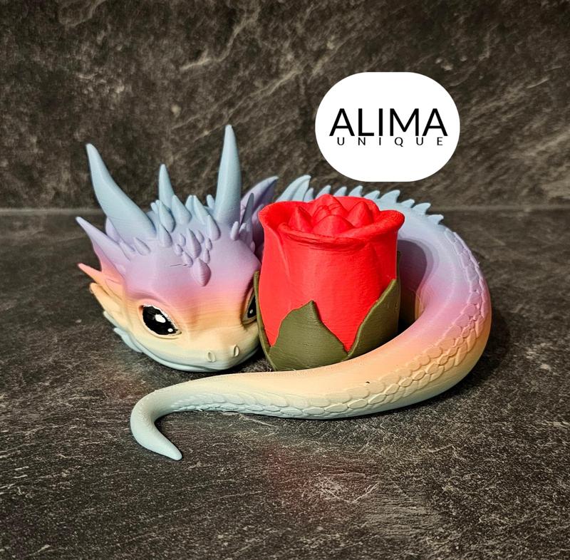 Dragon baby with a rose for Valentine’s Day
