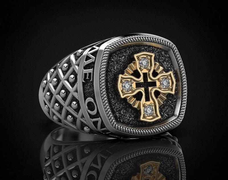 Ring with a cross and patterns on it 440