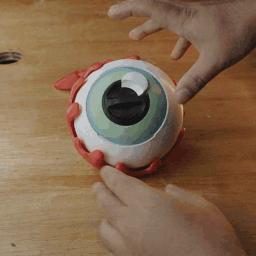 THE EYEBALL CONTAINER, ARTICULATED, FLEXI TOY / DECORATION
