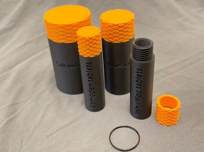 Screw top containers with TPU seal, embossed label
