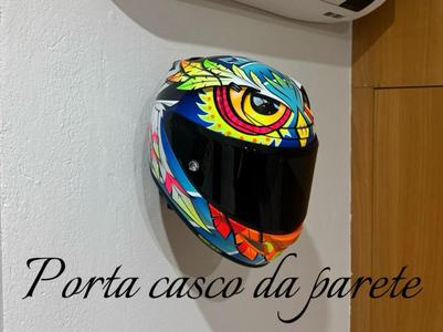 Wall mounted helmet holder