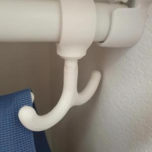 Rotatable tube/pipe hook