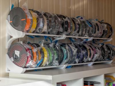 Wall mounted filament spool holder
