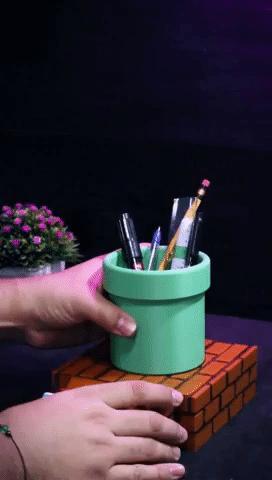 Pencil holder with secret drawer, with spaces for USB, microSD and SD memory sticks with Mario Bros. theme.