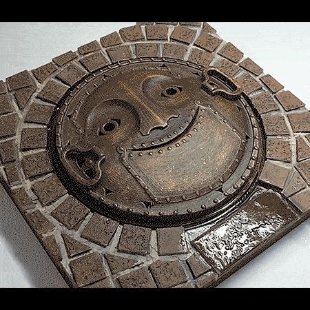 Smiling manhole cover of the Ghibli Museum