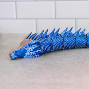 Rattle skin dragon articulated