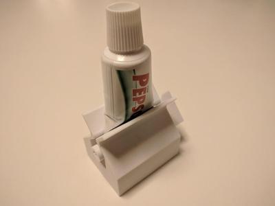 Toothpaste squeezer (holder)