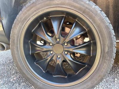 Universal wheel hub centre cap