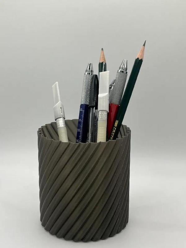 Pencil pot twisted and round shape   