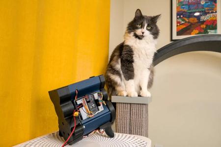 Smart cat treat dispenser for "one fast cat" wheel   