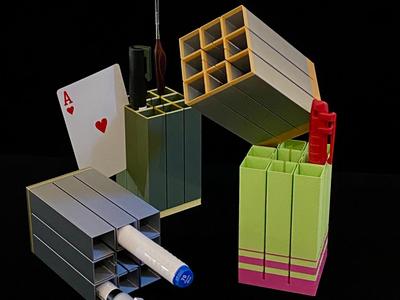 OneLiner all-purpose modular pen holder, featuring expandability, card-insertable cable channels, high-efficiency printing (average 1 hour), and a mesh non-slip water-repellent base