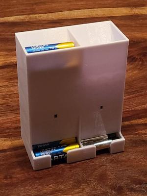 Battery dispenser for AA and AAA batteries