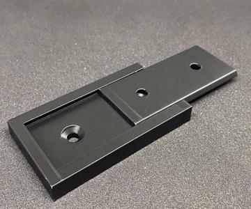 Just a universal wall mount, but only 7mm thick