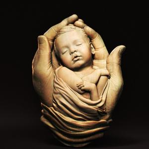 Baby In Hands Relief 01
