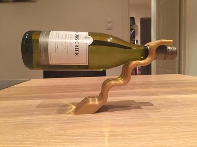 Balancing wine bottle holder