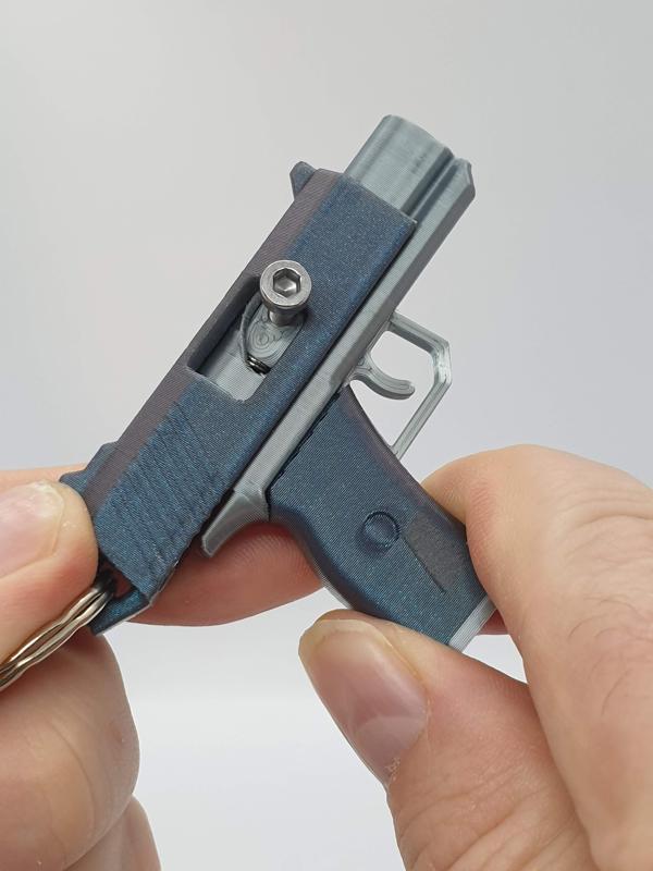 Pistol Keychain — Functional Blaster & Fidget Toy