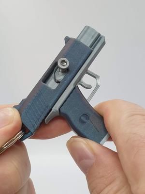 Pistol Keychain — Functional Blaster & Fidget Toy