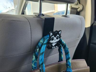 Car seat headrest hook