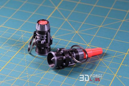 Turbine keychain with collapsible flame