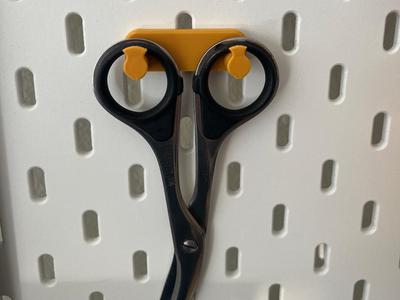 Ikea Skadis pegboard holder for scissors