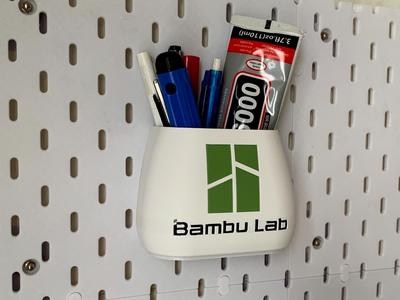 Storage bin (can be mounted on pegboard or placed on a table)