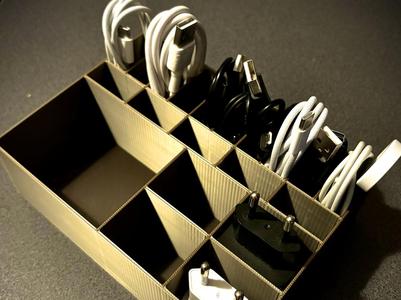 Storage organizer box for charger cable