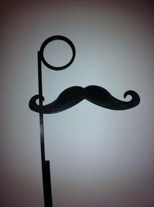 Mustache and Monocle on a thin Stick