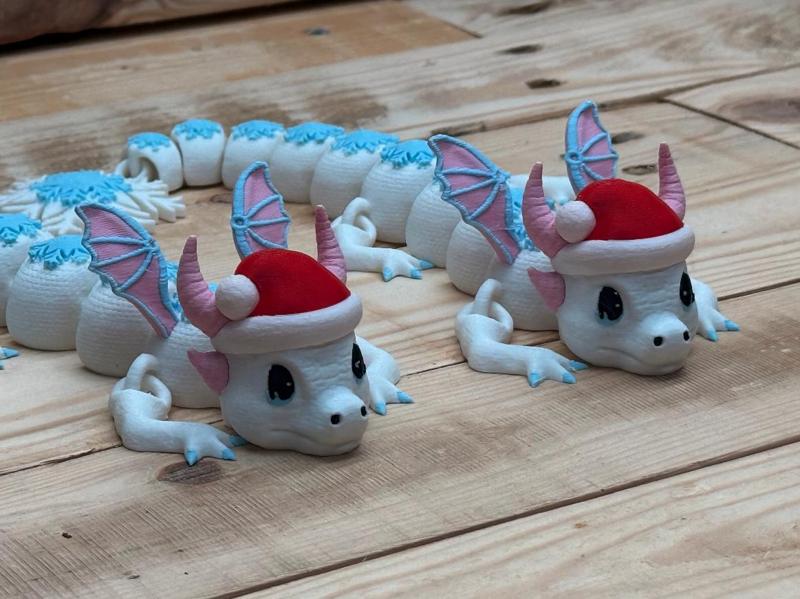 Snow Dragon wearing a Santa hat