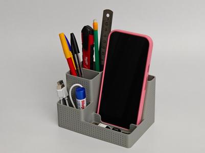 Pebble, a minimal desk organizer and phone stand