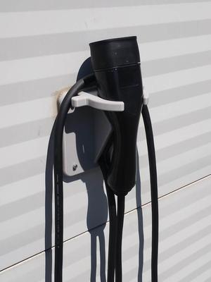 Wall hanger for Type 2 charging cable plug